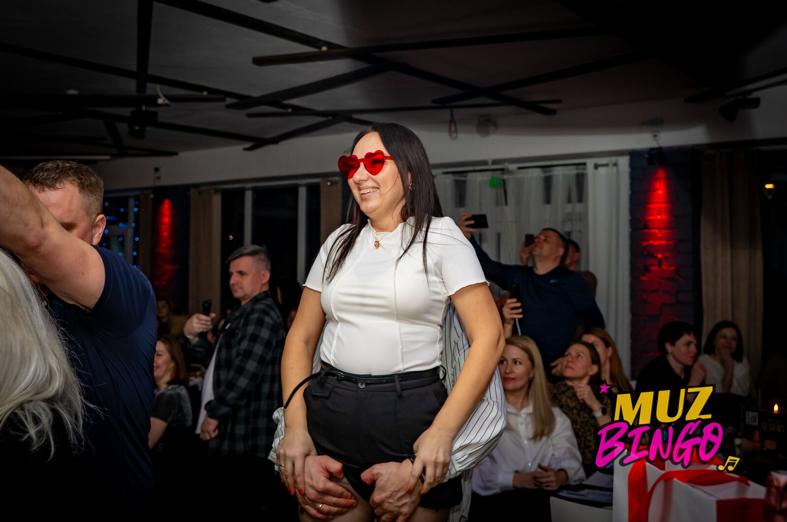 Happy guest with heart glasses
